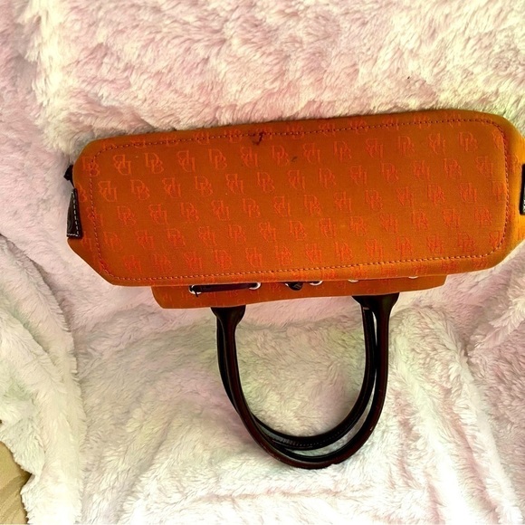 GENTLY used dooney bourke handbag orange. - Picture 7 of 7